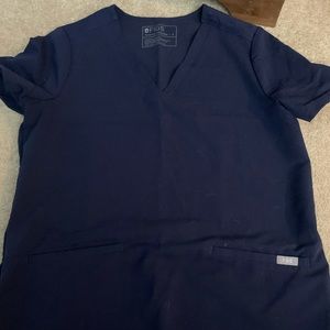 Navy blue figs 2 pocket scrub top. Small